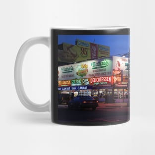 Nathan's famous hot dogs kiosk in Coney Island, at dusk Mug